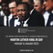 A group of people, one prominently, with Richmond American University London text commemorating Martin Luther King Jr Day on 16 January 2023.