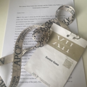 Conference paper titled about the Labour Party under Keir Starmer, accompanied by an APCP badge with a lanyard, labeled "Eunice Goes."