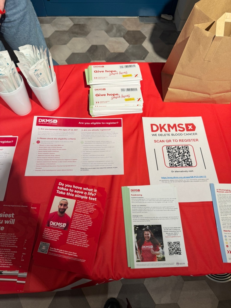 service learning students on campus dkms stem cell swab drive stall