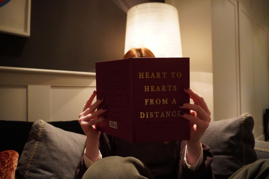 Caitlin Farrell with her Heart to Hearts From A Distance book